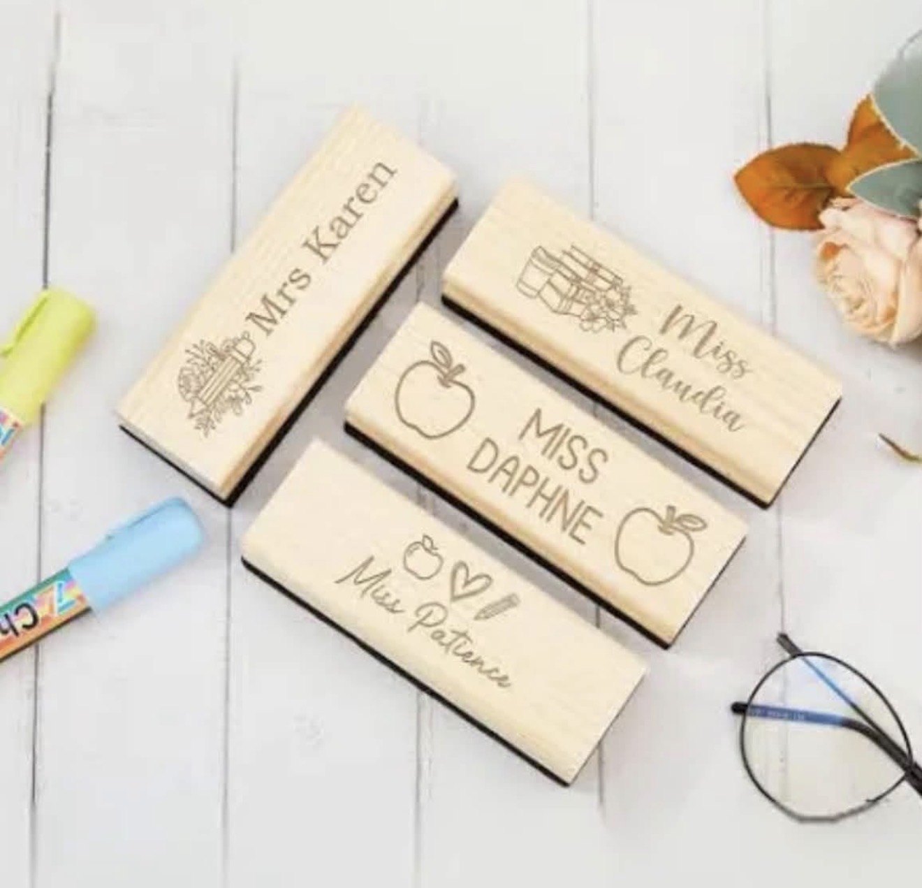 Engraved wooden board erasers personalized with teacher names and icons